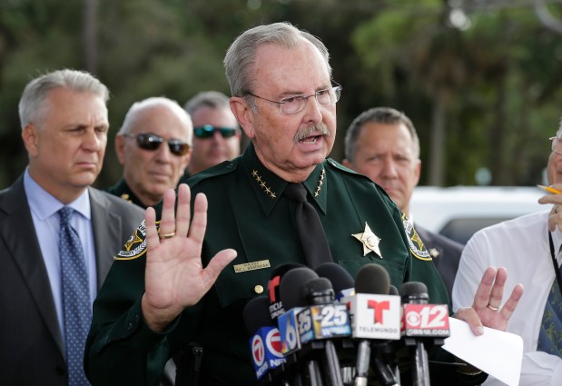 Palm Beach County Sheriff Ric Bradshaw said PBSO would not participate in local police efforts to help round up and deport undocumented immigrants as suggested by former President Donald Trump. Bradshaw said tighter security at the southern U.S. border is essential. (Terry Renna/Associated Press)