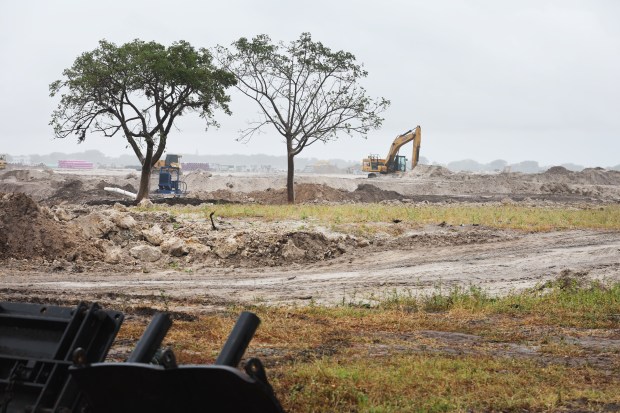 GL Homes has begun clearing the site of what will become its third Lotus residential community, which will feature up to 700 single family homes. The site sits between Lyons Road and U.S. 441 near Olympic Heights High School. (Carline Jean / South Florida Sun Sentinel)