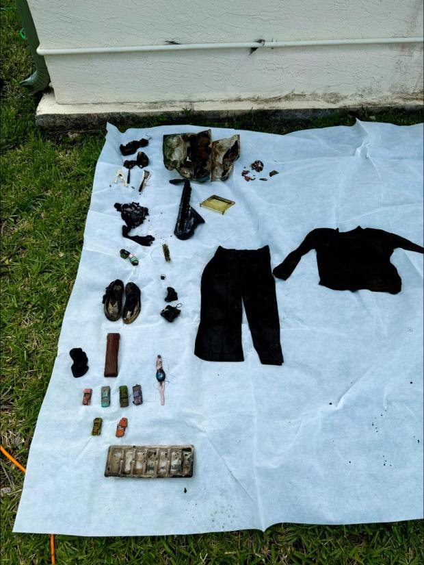 Clothes and toys were recovered from a 1960s model Chevrolet Impala that was discovered in a canal in the 10100 block of West Broward Boulevard on Saturday, Aug. 10, 2024. (Sunshine State Sonar/Courtesy)