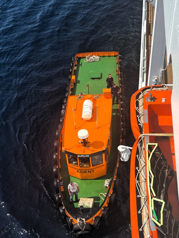 Turkish authorities come aboard the Oceania Nautica to investigate an apparent suicide. (Photo by David Dickstein)