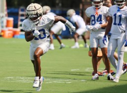 Receiver Tank Hawkins, a true freshman from IMG Academy, is one of the Gators' fastest players. (Stephen M. Dowell/Orlando Sentinel)