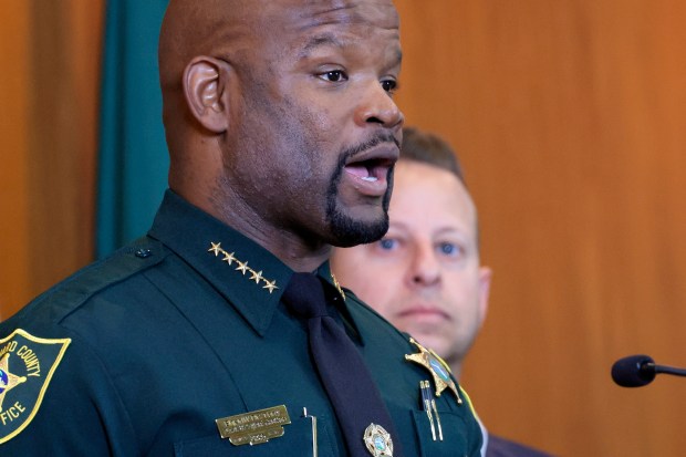 Broward Sheriff Gregory Tony speaks as Congressman Jared Moskowitz looks on during a news conference held at the BSO Public Safety Building in Fort Lauderdale on Thursday, June 20, 2024, to announce federal funding awarded to BSO for their Real Time Crime Center and Digital Forensics Unit. (Amy Beth Bennett / Sun Sentinel)