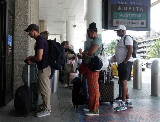 Long lines snake out the door at the Terminal 2 check-in counter at Fort Lauderdale-Hollywood International Airport on Monday, July 22, 2024. A global technology outage from last week is still hampering Delta Airlines. (Joe Cavaretta/South Florida Sun Sentinel)