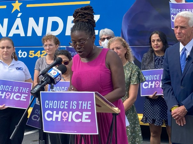 Nancy Metayer Bowen, a Coral Springs commissioner, speaks about abortion rights at an Oct. 11, 2022, news conference outside the African American Research Library and Cultural Center in Fort Lauderdale. Behind her is U.S. Rep. Debbie Wasserman Schulz, D-Weston, and (right) 2022 Democratic gubernatorial nominee Charlie Crist. (Anthony Man/South Florida Sun Sentinel)