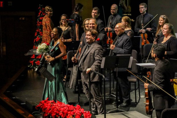 Symphony of the Americas artistic director and conductor Pablo Mielgo with soprano Kyaunnee Richardson on Dec. 6, 2022. The symphony is one of many arts organizations working to fill a funding shortfall after Gov. Ron DeSantis eliminated the state arts and cultural grant program for the fiscal year beginning July 1, 2024. (Zak Bennett/Courtesy)