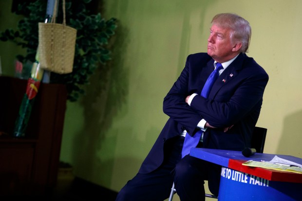 Republican presidential candidate Donald Trump listens to a question during a campaign event at Little Haiti Cultural Center, Friday, Sept. 16, 2016, in Miami. (AP Photo/ Evan Vucci)