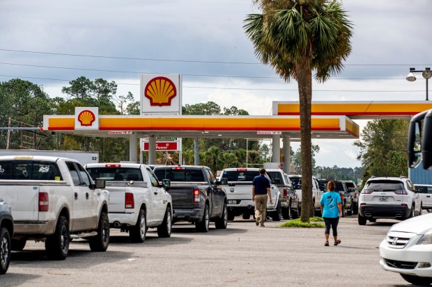 The Shell gas station just south of Perry, Fla., has a line of cars backed up onto the road on Thursday, Aug. 31, 2023. Taylor County felt the full impacts of Hurricane Idalia, which made landfall near Category 4 strength on Wednesday morning. (Patrick Connolly/Orlando Sentinel)