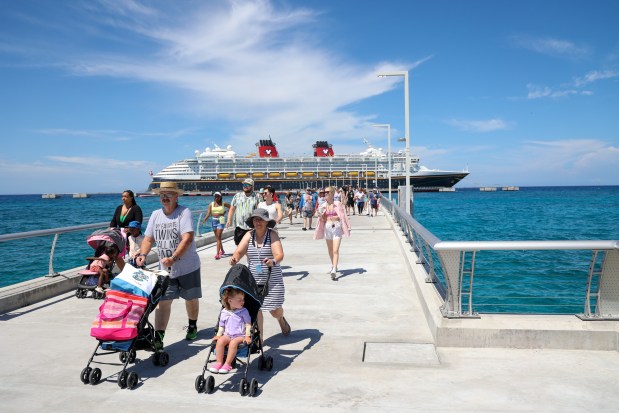 Disney Cruise Line guests make their way from the Disney Wish to Lookout Cay at Lighthouse Point on Saturday, June 8, 2024, Disney Cruise Line's newest destination on the island of Eleuthera in The Bahamas. (Rich Pope/Orlando Sentinel)