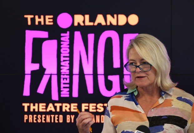 United Arts of Central Florida President and CEO Jennifer Evins said she hoped to build bridges with Gov. Ron DeSantis after his veto of state arts grants. She spoke during a media event by Orlando Fringe and Tampa Fringe, at Orlando Family Stage on July 11. (Ricardo Ramirez Buxeda/ Orlando Sentinel)